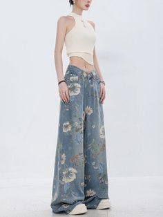 Cute denim pants with a floral design that attracts attention.

This piece is a well-balanced mix of casual and girly elements.

The thick wide silhouette does not emphasize the line of your legs and makes it easy to maintain balance.
◾️Model
Height/Weight：163cm(64.1in)/44kg(97.0lb)
Fitting Size：S





Cm
(inches)

Length
Waist
Hip


S
104(40.9)
62(24.4)
104(40.9)


M
106(41.7)
66(25.9)
108(42.5)


L
108(42.5)
70(27.5)
112(44.0)


XL
110(43.3)
74(29.1)
116(45.6) Spring Cotton Jeans, Spring Floral Print Cotton Pants, Spring Cotton Flare Jeans Full Length, Spring Cotton Full-length Flare Jeans, Spring Cotton Full Length Flare Jeans, Casual Mid-rise Bottoms With Floral Print, Spring Full-length Cotton Jeans, Spring Full Length Cotton Flare Jeans, Casual Floral Print Cotton Wide Leg Pants