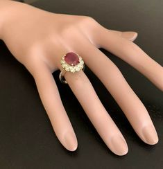 7.20 Carats Impressive Natural Red Ruby and Diamond 18K Yellow Gold Ring Suggested Replacement Value: $5,400.00 Total Red Ruby Weight is: Apprx. 6.00 Carats (Lead Glass Filled) Ruby Measures: Approx. 11.00 x 9.00mm Natural Round Diamonds Weight: Approx. 1.20 Carats (color G-H / Clarity SI1-2) Ring total weight: Approx. 5.9 grams Disclaimer: all weights, measurements and colors are approximate and may vary slightly from the listed dimensions or as seen in the image. All pictures are magnified to Luxury Yellow Gold Round Ruby Ring, Luxury 14k Gold Round Ruby Ring, Luxury Ruby Cabochon Ring, 14k Gold Red Cabochon Ruby Ring, Luxury 14k Gold Ruby Cabochon Ring, Etsy Gold Ring, Leaded Glass, 18k Yellow Gold Ring, Natural Red