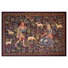 an old tapestry with two people and animals