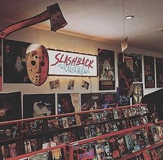 there are many movies on display in the store, including friday night's horror