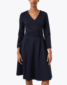 The timeless Thyme dress from Jane offers a chic take on a classic shape. Crafted from a flattering and comfortable stretch jersey, the a-line silhouette is belted at the waist and features a v-neckline for a ladylike finish. Wear it with heels and a coordinating clutch for a polished ensemble you can wear anywhere. Classic A-line Belted Dress, Classic Navy A-line Dress, Classic Navy Dress With Button Closure, A-line Mini Dress With Flattering Silhouette In Elastane, Navy A-line Cotton Dress, Fit And Flare Dress, Jersey Dress, Thyme, Fit And Flare