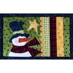 a quilted snowman with stars on it