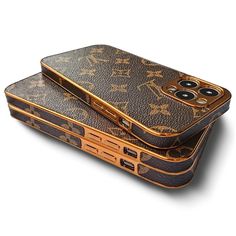 two louis vuitton cases stacked on top of each other