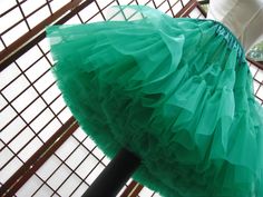 "This listing is for a custom order for the emerald green/kelly green single layer petticoat in the photos. It will be made of soft nylon organdy with bridal satin waist. The pictured petticoat was designed for a 27\" (68,5cm) waist and is 24\" (61cm) long. Please feel free to ask me any questions :) WAIST: Please select your waist from the listed ranges in inches or centimeters. LENGTH: Please let me know your desired length up to 25\" (64cm). If you need a longer length, please contact me. COL Fitted Green Petticoat For Spring, White Chiffon, Polyester Satin, Kelly Green, Petticoat, Custom Items, Color Choices, Wedding Outfit, Emerald Green