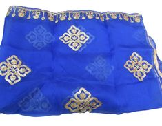 Pattern - an embroidered scarf. Ideal for - women/ girls. Occasion - formal or casual. Ideal for functions or parties. Fabric - organza silk, has a fine texture with a nice fall. Color - blue, on blue background floral embroidery, is with golden gota thread. Size - 34 x 100 inches approx. Can be wrapped in different styles. Care - gentle hand wash. For more such scarves please visit- For more such scarves For all orders, $120 and above, it will be express delivery through DHL confirmed delivery Elegant Embroidered Blue Shawl, Elegant Blue Dupatta With Floral Embroidery, Blue Organza Dupatta For Celebration, Royal Blue Embroidered Dupatta, Blue Embroidered Organza Dupatta, Blue Shawl For Wedding And Festivals, Traditional Blue Scarf For Festive Occasions, Traditional Blue Scarves For Festive Occasions, Traditional Blue Festive Scarves