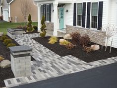 a house with landscaping in the front yard