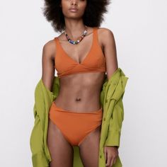 Step Into Style With These Chic New With Tags (Nwt) Zara High-Waisted Bikini Bottoms In A Stunning Burnt Orange Color. Crafted With Attention To Detail And Quality, These Bikini Bottoms Are Perfect For Making A Fashion Statement At The Beach Or By The Pool. The High-Waisted Design Offers Both Comfort And Coverage, While The Vibrant Color Adds A Touch Of Boldness To Your Swimwear Collection. Whether You're Lounging Under The Sun Or Taking A Dip In The Water, These Bikini Bottoms Are Sure To Make Solid Stretch Cropped Swimwear, Cropped Solid Color Swimwear For Summer, Summer Cropped Swimwear, Zara Solid Color Beachwear Swimwear, Zara Beachwear For Vacation, Zara Vacation Swimwear, Zara Casual Stretch Swimwear, Zara Stretch Summer Swimwear, Zara Summer Swimwear With Lined Body