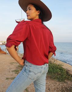 Red blouse with half sleeves. Collared. Button down. Size S. EU 34-38 / UK 6-10 Measurements - 38"/ 97cm bust, 16"/ 41cm sleeve length, 22"/ 56cm shirt length. Material - Polyester. Condition - Excellent. Sustainability - Vintage. Handpicked, repaired and ready to wear. This is an original vintage item, not new and minor signs of wear and age are expected, we will highlight any major flaws. Model is a UK 6/8 and is 5'7" tall. Red Half Sleeve Shirt For Summer, Red 3/4 Sleeve Summer Blouse, Red Half Sleeve Summer Blouse, Summer Half-sleeve Blouse With Roll-up Sleeves, Summer Half Sleeve Blouse With Roll-up Sleeves, Fall Half Sleeve Shirt With Buttons, Fall Short Sleeve Blouse With Rolled Sleeves, Fall Blouse With Rolled Short Sleeves, Fall Short Sleeve Blouse With Roll-up Sleeves