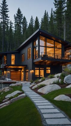 a modern house in the woods at night