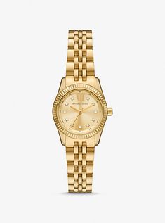 The Lexington watch exudes everyday glamour with its gold hue and sparkling pavé accents. Made entirely of stainless steel, this mini timepiece boasts a round face with a beveled topring and a matching bracelet strap. Slip it on to give both day and night outfits a dose of sophisticated charm. Hailey Bieber Rolex Watch, Womens Watches Gold, Jewerly Stacks Gold, Old Money Wishlist, Women’s Watch, Watch Women's Classy, Women Watches Classy Elegant, Michael Kors Watches Women, Michael Kors Watch Women's