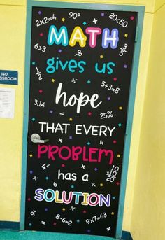 a blackboard that says math gives us hope, that every problem has a solution