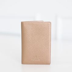 Upgrade your travel game with our stylish passport holder. Designed to keep your passport safe and secure, this holder adds a touch of glam to your travel essentials. Measuring at 4"x6", it is compact and easy to slip into your travel bag or pocket. Stay organized and travel in style with our passport holder, the perfect companion for your globetrotting adventures. Please note that due to the unique nature of our products, the exact color patterns may vary slightly from the image shown, adding t Elegant Gold Card Holder For Travel, Elegant Gold Travel Card Holder, Gold Travel Wallets With Card Slots, Luxury Bifold Card Holder For Travel, Gold Wallets With Card Slots For Travel, Compact Travel Card Holder With Interior Slots, Modern Compact Travel Card Holder, Gold Bifold Wallet For Travel, Gold Bifold Wallets For Travel