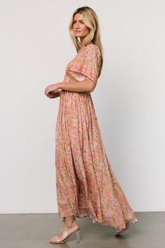 Step into timeless elegance with our Evanthia Vintage Blush print maxi dress, crafted from lightweight Rayon fabric and featuring a V-neckline with an ascending point bodice detail. Embrace sophistication and grace with this stunning piece perfect for any special event. Pink V-neck Dress With Elastic Waistband, Pink Maxi Dress With Elastic Waistband For Beach, Casual Pink Maxi Dress With Elastic Waistband, Pink Maxi Dress With Elastic Waistband For Vacation, Pink Maxi Dress With Elastic Waistband For Spring, Pink Maxi Dress With Elastic Waistband For Summer, Pink Boho Print Maxi Dress With Short Sleeves, Pink Boho Print Short Sleeve Maxi Dress, Pink Bohemian Dress With Flutter Sleeves