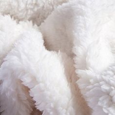 closeup of white fluffy fur on the back of a stuffed animal