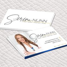 a white business card with a woman's face on the front and back of it