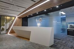 an office lobby with modern design and wood accents