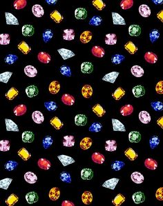 many different colored diamonds on a black background