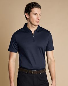 Zip-Neck Jersey Polo - Navy | Men's Charles Tyrwhitt Zip-Neck Jersey Polo Shirt - Navy Blue Size Large Cotton Modern Polo Collar Top For Business, Modern Business Polo Collar Top, Modern Business Top With Polo Collar, Casual V-neck Business Tops, Casual V-neck Tops For Business, Cutaway Collar, Lightweight Blazer, Charles Tyrwhitt, Navy Man