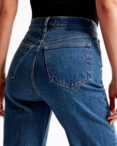 Step back into the '90s with these high-rise relaxed jeans from Abercrombie & Fitch, perfect for capturing that effortlessly cool vintage vibe. 

- Size: 32 SHORT
- Color: Dark
- Material: Cotton, Elastane
- Gender: Female
- Fit: High rise (10.5”), fitted at the waist and hips, relaxed full-length leg
- Features: Clean hem, vintage stretch fabric for comfort

Crafted to offer both style and comfort, these jeans blend a classic dark marble wash with a modern stretch fabric, ensuring a flattering Classic Bottoms With Frayed Hem For Everyday, Dark Wash Mid-rise Rigid Denim Bottoms, Mid-rise Dark Wash Rigid Denim Bottoms, Mom Fit Rigid Denim Cropped Leg Bottoms, Classic Fitted Bottoms With Frayed Hem, Classic Straight Hem Jeans For Summer, Classic High Rise Bottoms With Frayed Hem, Straight Fit Bottoms With Frayed Hem In Medium Wash, Classic Medium Wash Flare Jeans For Summer