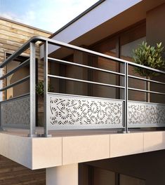 a balcony with metal railing and potted plant on the balconies above it