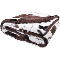 two brown and white animal print blankets on top of each other, one is folded up