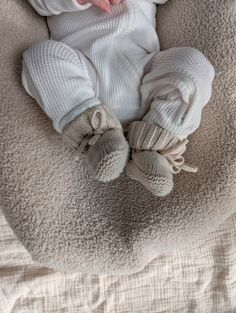 Introducing our brand new knitted booties, made to pair perfectly with our knitted headwear range. Each pair of booties is meticulously crafted from 100% soft, high quality cotton, with just the right amount of stretch for your baby's comfort. Perfect for keeping your little love's feet cosy and warm without compromising style. Knitted Baby Booties, Comfortable Soft Booties For Playtime, Cream Casual Winter Booties, Casual Cream Winter Booties, Comfortable White Winter Booties, Comfortable Cream Winter Booties, Comfortable Winter Booties With Soft Sole, Cozy Winter Booties With Soft Sole, Comfortable Soft White Booties