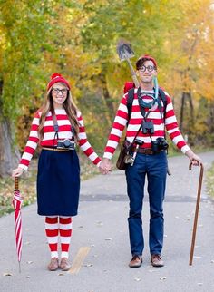 two people dressed up in costumes for halloween