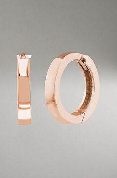 Versatile 10mm square tubes are polished to a high shine in these classic women's huggie earrings. Fashioned in 14K rose gold, the earrings secure in place with hinged backs. Classic Small Hoop Rose Gold Huggie Earrings, Classic Rose Gold Small Hoop Huggie Earrings, Minimalist Rose Gold Huggie Earrings For Formal Occasions, Classic Rose Gold Huggie Earrings For Formal Occasions, Formal Rose Gold Tarnish Resistant Huggie Earrings, Formal Rose Gold Tarnish-resistant Huggie Earrings, Formal Rose Gold Huggie Earrings With Polished Finish, Polished 14k Rose Gold Huggie Earrings, Modern 14k Rose Gold Huggie Earrings