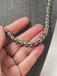 "This is an 18\" silver tone beaded necklace, signed PARKLANE  (signed on tag by clasp).  The beads are 8 mm in size and strung on chain with a box clasp.  The necklace is in very good vintage condition with no noted flaws. We will send it to you in a gift box with free domestic shipping.  Money from the sale of items in our shop goes to support the ministries and programs of Rocky Cross Baptist Church.  www.rockycross.org Click here to see other necklaces in our shop." Silver Necklace With 8mm Beads For Gifts, Silver Nickel-free Beaded Necklaces, Silver Single Strand Necklace For Formal Occasions, Formal Silver Single Strand Beaded Necklace, Nickel-free Silver Beaded Necklaces, Nickel-free Silver Beaded Necklaces With Round Beads, Silver Nickel-free Beaded Necklaces With Round Beads, Silver Beaded Necklaces With 8mm Beads For Jewelry Making, Silver Necklaces With 8mm Beads For Jewelry Making