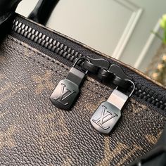 SHOP MORE LUXURY PRODUCTS HERE Description Louis Vuitton Keepall Bandouliere 50 Monogram Galaxy Canvas For Women, Travel Bags 19.7in/50cm LV An icon since the appearance in 1930, the Keepall embodies the spirit of modern travel. Light, supple and always ready for immediate departure, the bag lives up to its name: those adept at the art of packing can easily fit a week’s wardrobe into the generously sized (and cabin-friendly) Keepall 50. Shown here in classic Monogram Canvas, with a strap f Monogram Canvas Bag With Logo Hardware For Travel, Rectangular Monogram Canvas Bag With Logo Hardware, Luxury Travel Bags With Logo Hardware, Designer Travel Shoulder Bag With Lock, Luxury Travel Bag With Logo Hardware, Designer Shoulder Bag With Lock For Travel, Classic Bags In Monogram Canvas With Lock, Classic Bag With Lock In Monogram Canvas, Classic Bags With Lock In Monogram Canvas