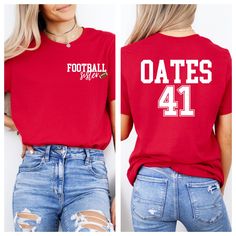 Customize this Football Family t-shirt with your title such as "Football Mom," or "Football Dad" on the front of the shirt and with your football player's last name and Jersey number on the back. This is the perfect cheer squad shirt for any family that attends football school sports games.  Please ask about custom designs-we LOVE creating custom work! 👕 WHAT YOU ARE GETTING -Personalized Football Family t-shirt 💲HOW TO ORDER -Select shirt color -Select shirt size -In the personalization box e Red T-shirt With Name Print For Game Day, Relaxed Fit Tops With Team Name For Football Season, Relaxed Fit Sports Fan T-shirt, Red Team Spirit Tops With Name Print, Red T-shirt With Name Print For Sports Events, Red Name Print T-shirt For Sports Events, Red Team Spirit T-shirt With Name Print, College Football Season T-shirt With Sublimation Print, Game Day Red T-shirt With Name Print