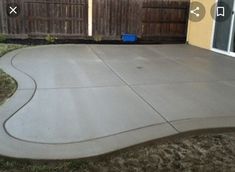 a concrete patio in front of a house