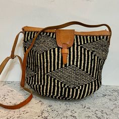 Black And White Hand Woven Crossbody Bag With Brown Leather Trim ( J0524) This Is A Beautiful Crossbody Bag Made Of Natural Fiber, Handwoven In Colors Of Black And White And Comes With A Brown Leather Trim And Strap. It Measures 12 Inches Long, 10 Inches High And 8 Inches Wide And The Strap Is About 44-48 Inches Long. It Is In Very Good Condition As Shown In Photos. No Maker’s Label Found. Pictures Are Worth A Thousand Words So Please Super Size Photos For Condition Details. Leather Trims, Natural Fibers, Bag Making, Brown Leather, Crossbody Bag, Black And Brown, Bag Lady, Hand Weaving, Shoulder Bag