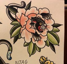 an image of a cat with flowers on it's face and the words nitag written in japanese