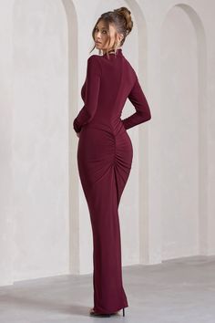 Timeless yet contemporary, Lynn was designed to see you through any formal event. Crafted in a luxurious burgundy hue, this long-sleeve maxi dress arrives in a body sculpting stretch jersey that effortlessly caresses your contours. Defined by a ruched drawstring detail, Lynn is finished with a striking high-leg split.   Features  - Premium stretch jersey - High neckline  - Long sleeves - Invisible zip closure  - Ruched drawstring detail - Partial ruching - High leg spit - Maxi length    Sizing & Fit  Model is5'7' and wears UK size8 / US size 4   Product Information     Double layered with good stretch  Premium jersey in Burgundy (95% Polyester, 5% Elastane)  155cm total length  SKU: CL129797069 Maroon Outfit, Black Dress Prom, Black Tie Gala, Party Dress Long Sleeve, Split Maxi Dress, Classy Work Outfits, Bridesmaid Outfit, Black Sequin Dress, Body Sculpting