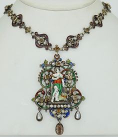 This is a hallmarked Austro-Hungarian 800 Silver Necklace. This necklace is heavily decorated fine enamel work and natural stones. My favorite part of this necklace is the lavender enamel on the chain. I rarely see this color and I very much welcome it. This necklace dates from the late victorian era. It is hallmarked on the box clasp with a Dog hallmark with a 3 and a P, This indicated the time period of 1872-1922 and the P indicated it was crafted in Hungary. The center drop is a fairly intric Victorian Enamel Medallion Necklaces, Antique Enamel Necklace Hallmarked, Antique Enamel Necklace With Hallmark, Antique Enamel Hallmarked Necklaces, Antique Jewelry Necklace, Austro Hungarian, Wide Cuff Bracelets, Citrine Necklace, Box Clasp