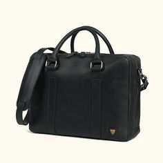 We are excited to bring in this collaboration with Jack Andrews—a new brand in the vintage leather luxury space. It brought us into our only and limited edition black full grain leather collection in the Buffalo Jackson product mix. Perfectly sophisticated, but not too stuffy. Details in all the right places. Introducing our Jefferson Leather Briefcase Bag—a perfect blend of vintage elegance and rugged old-world charm, crafted in rich vintage black full-grain leather. This briefcase features two Rugged Gentleman, Modern Briefcase, Leather Bags For Men, Buffalo Jackson, Dark Brown Leather Jacket, Leather Briefcase Bag, Briefcase Bag, Leather Jacket Style, Leather Duffle Bag