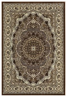 a brown and beige rug with an intricate design