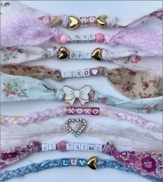 six headbands with bows and hearts on them