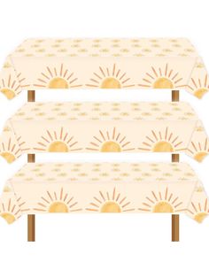 three tablecloths with sun designs on them