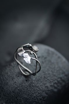 ITEM DESCRIPTION: This ring can be adjustable 5 - 6 (US and Canada) J 1/2 - M (UK and AU) Weight - 2 g. I made this plant ring of sterling silver and rainbow moonstone. It's so delicate and dainty! Two tiny ginkgo leaves look very elegant. Silver leaf ring will be a great addition to your jewelry collection or the present for someone whom you love. I can make this ring with various stones - just write to me to discuss the details. I'm always open to custom orders. This handmade ring will come to Unique Nickel-free Leaf-shaped Jewelry, Nature-inspired Adjustable Stackable Rings For Promise, Nickel-free Leaf-shaped Nature-inspired Jewelry, Adjustable Silver Flower Ring Nature-inspired, Adjustable Silver Leaf Jewelry, Hand Forged Open Ring In Nature-inspired Style, Adjustable Nature-inspired Rings For Anniversary, Handmade Adjustable Nature-inspired Ring, Nature-inspired Adjustable Stackable Rings As Gift