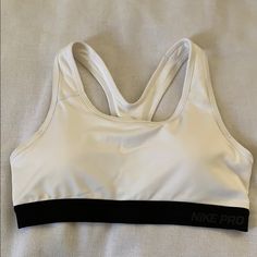 Shop ellen_sf's closet or find the perfect look from millions of stylists. Fast shipping and buyer protection. NWOT Nike Pro Sports Bra sz S. Black and white, removable padding. Sporty White Activewear With Built-in Padding, White Sporty Activewear With Built-in Padding, White Sports Bra With Built-in Padding And Athletic Fit, White Athletic Fit Sports Bra With Built-in Padding, White Sporty Sports Bra, Sporty White Sports Bra, Sporty White Sports Bra For Events, Sporty White Sweat-resistant Sports Bra, Nike White Sports Bra For Training