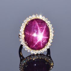 The Star of Bharany ring glistens like no other, with a beautiful star that shines through! This is a 27.62 carat one of a kind ruby that is surrounded by 1.26 carats of exquisite white diamonds. All set in 18k yellow gold. Size: 7 Weight: 13.1 grams Diamond Cuff Ring, Sapphire Antique Ring, Finger Cuff, European Cut Diamond Ring, Infinity Diamond Ring, Pave Bracelet, Cognac Diamonds, Gold Diamond Band, White Sapphire Ring