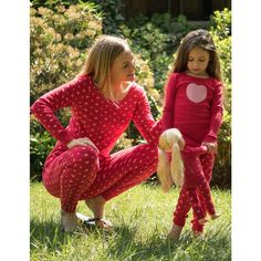 Those special events will be even more memorable with the Girl and Doll Cotton Pajamas, and the matching possibilities are endless. Every outfit features a long-sleeved shirt and elastic pants, both implementing ribbed cuffs at the ankles and wrists for extra comfort. Pajamas are machine wash cold inside out to ensure their best quality, with each outfit having a snug fit to keep wearers safe from fire dangers. Styles consist of many different colors like ballerina pink, moon and stars, plus so Long Sleeve Heart Print Sleep Set, Playful Long Sleeve Matching Set, Heart Print Long Sleeve Pajama Party Sets, Pink Long Sleeve Sleepwear With Heart Print, Matching Long Sleeve Playwear Sets, Playful Fitted Sets For Sleepovers, Family Matching Long Sleeve Pajama Sets, Family Matching Fitted Long Sleeve Sets, Winter Pjs