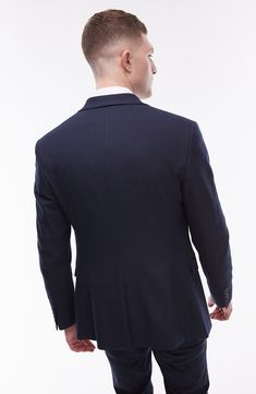 A lightly textured weave distinguishes this suit jacket tailored in a smart skinny fit and framed with handsome notched lapels. 30" length (size 42R) Notched lapels Chest welt pocket; front flap pockets Nonfunctional four-button cuffs Lined 64% polyester, 34% viscose, 2% elastane Dry clean Imported Tailored Suits With Double Button Closure For Office, Blue Business Blazer With Concealed Placket, Blue Blazer With Concealed Placket For Business, Tailored Single Breasted Sport Coat For Semi-formal Occasions, Slim Fit Single Breasted Blazer For Office, Slim Fit Single Breasted Office Blazer, Office Blazer Single Breasted Slim Fit, Office Slim Fit Single Breasted Blazer, Slim Fit Tuxedo Blazer For Office