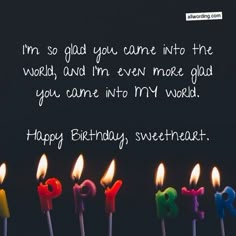 birthday candles with the words i'm so glad you came into the world, and i'm even more glad you came into my world