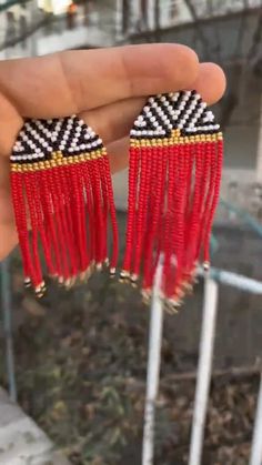 Traditional Fringed Beaded Earrings, Traditional Fringe Beaded Drop Earrings, Traditional Fringe Beaded Earrings With Round Beads, Traditional Beaded Earrings With Fringe And Round Beads, Traditional Beaded Dangle Earrings With Tassels, Traditional Beaded Tassel Dangle Earrings, Traditional Red Jewelry With Tassels, Traditional Red Beaded Chandelier Earrings, Traditional Beaded Fringe Dangle Earrings