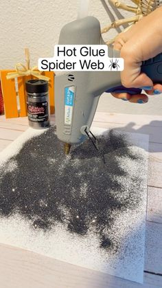 someone is using glue on the spider web