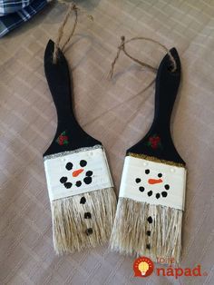 two black and white snowmen with fringes on them