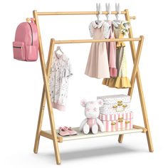 a wooden rack with clothes and toys on it